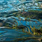 我们如何实现“业务 100% 云原生化，让阿里中间件全面升级到公共云架构”？