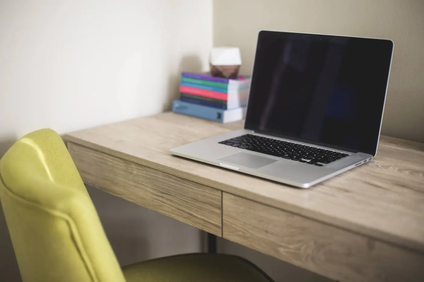 Silver-And-Black-Laptop-Computer-on-Brown-Wooden-Desk-Beside-Green_xfuerCK0OQ7l.jpeg